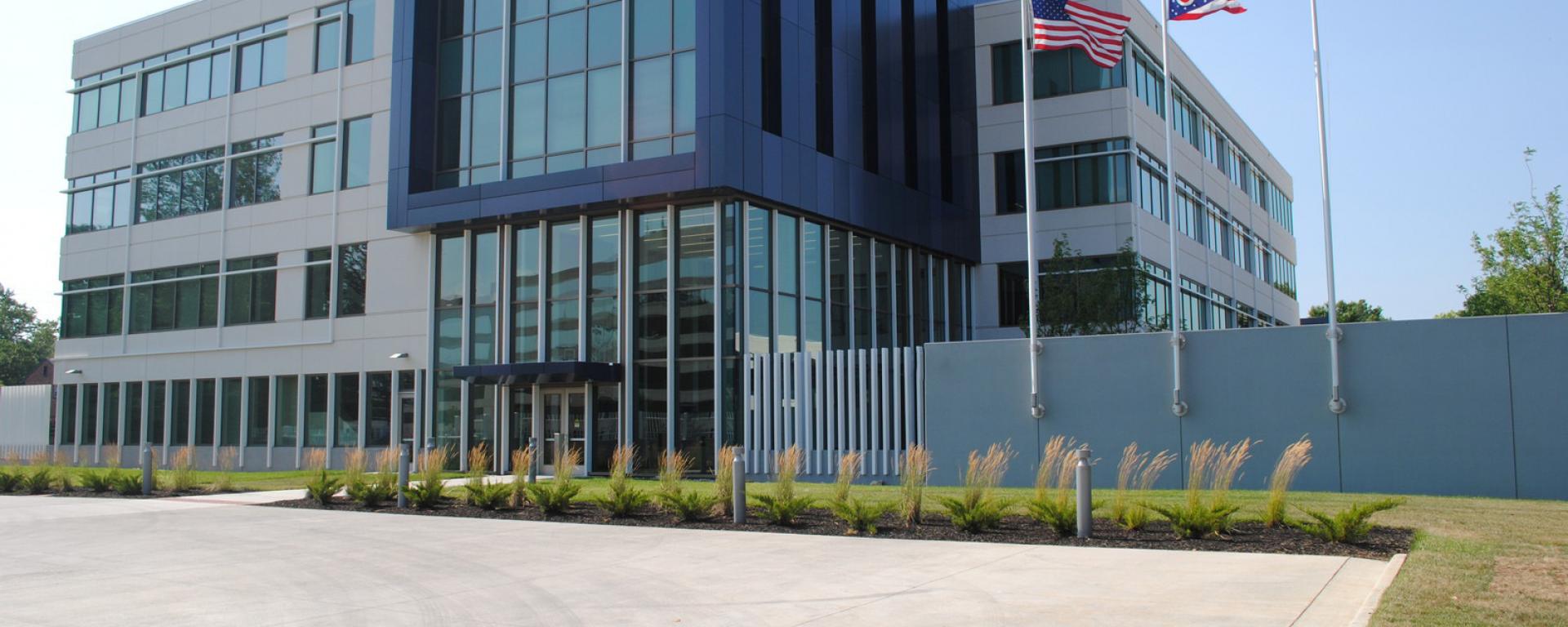 front entrance of building with landscaping