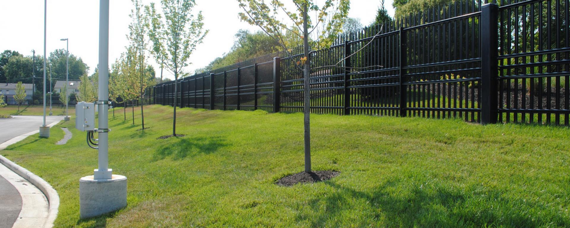 fencing alongside parking lot