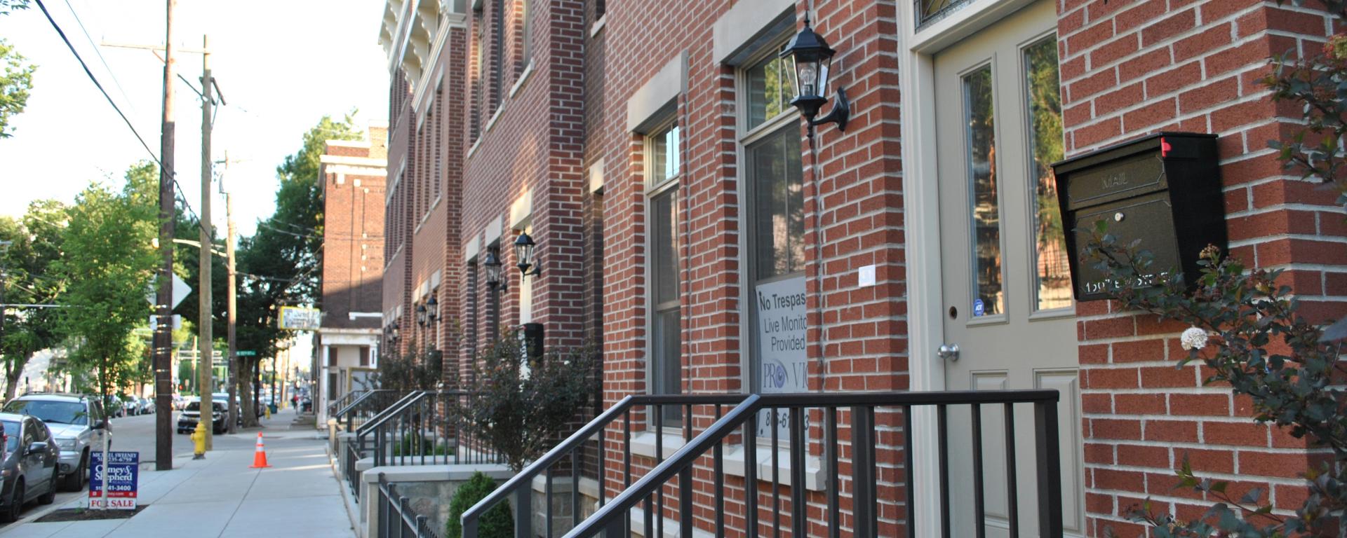 Streetscape of an entrance of townhome