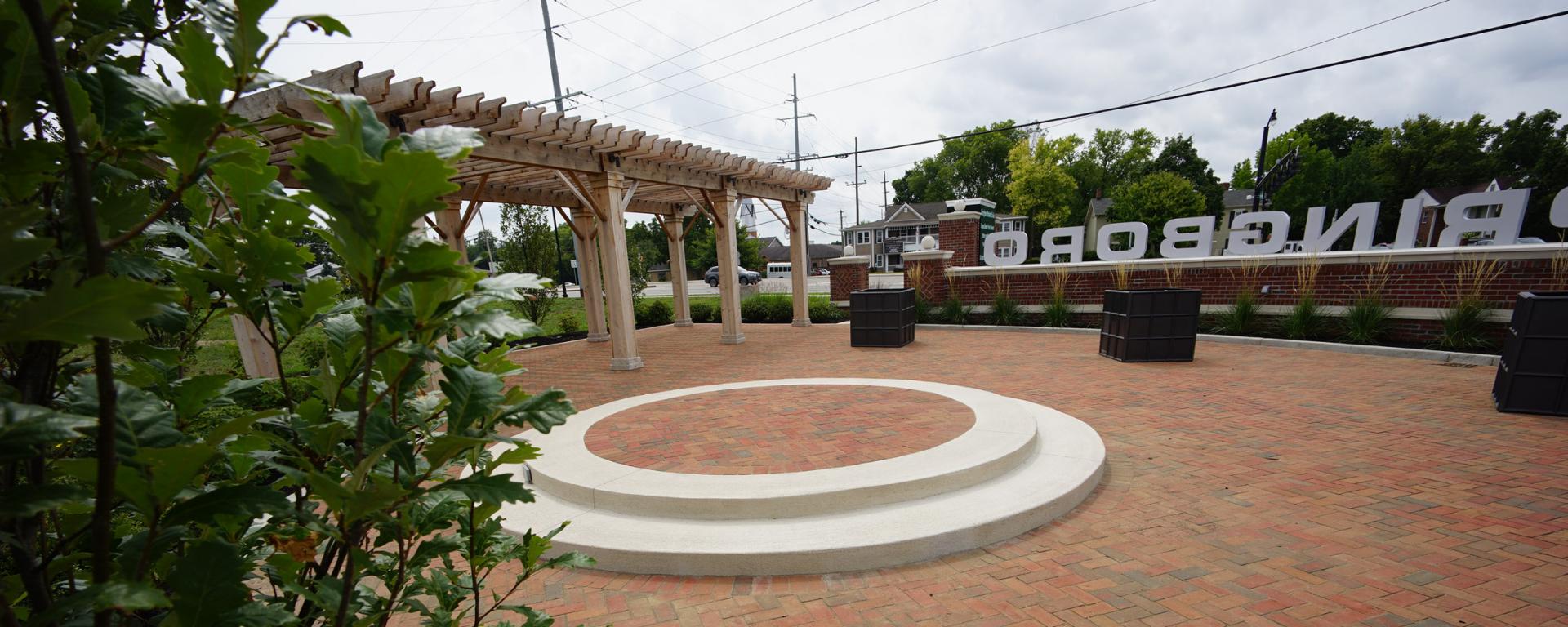 brick cobblestone area with raised platform