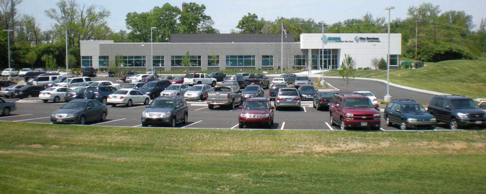 building front entrance and parking lot