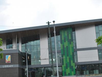 side profile of library with trees