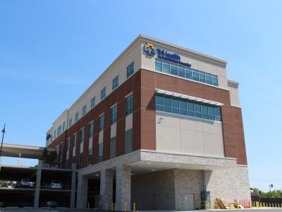 side profile of building and attached parking garage